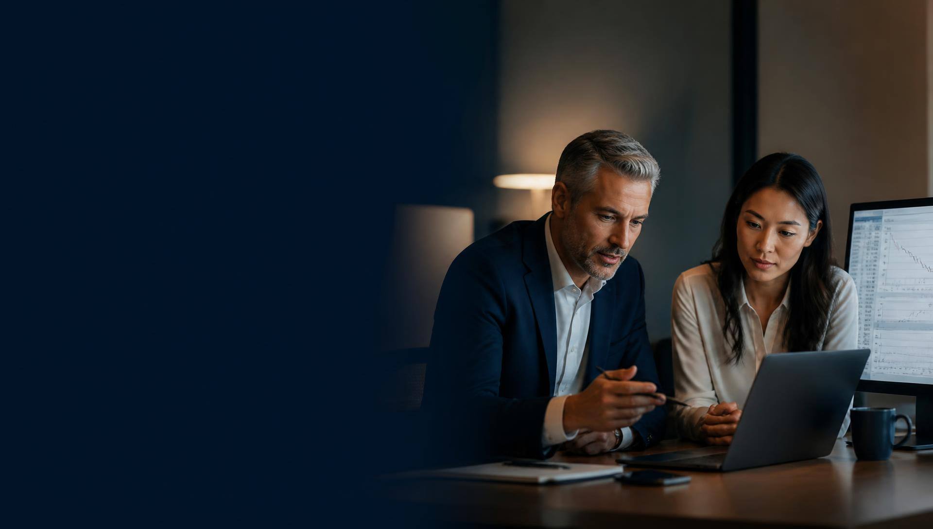 A finance leader and an operations analyst modelling an AI business case together on screen — Pronix.ai ROI calculators.